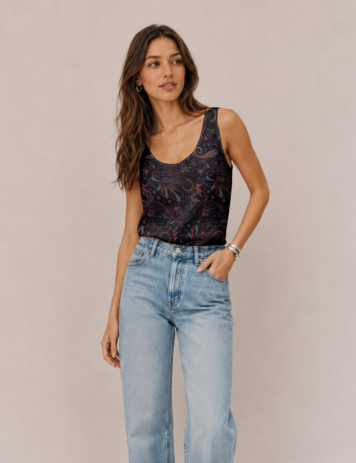Women's sleeveless blouse with a relaxed straight fit, wide scoop neckline, deep scoop back, and hip-length silhouette.