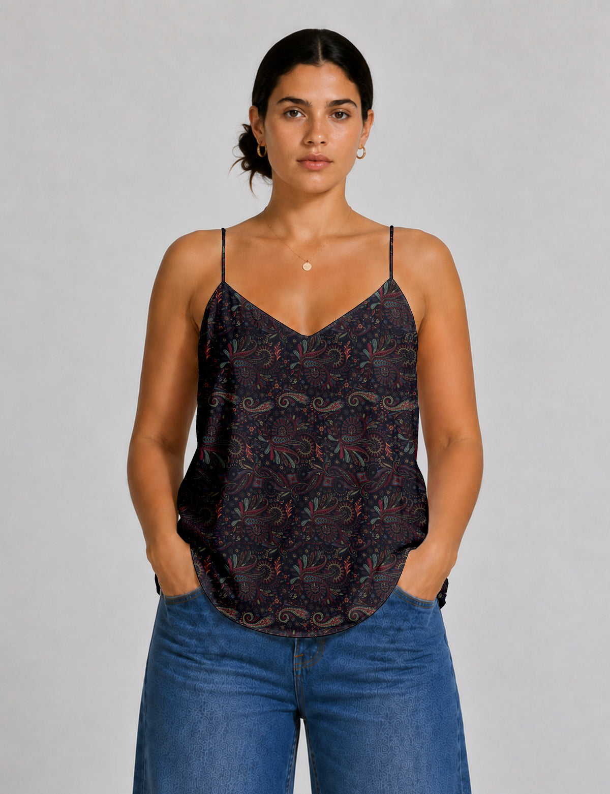 Women's sleeveless slip top with a relaxed straight fit, soft V-neckline, deep V-back, and delicate spaghetti straps.
