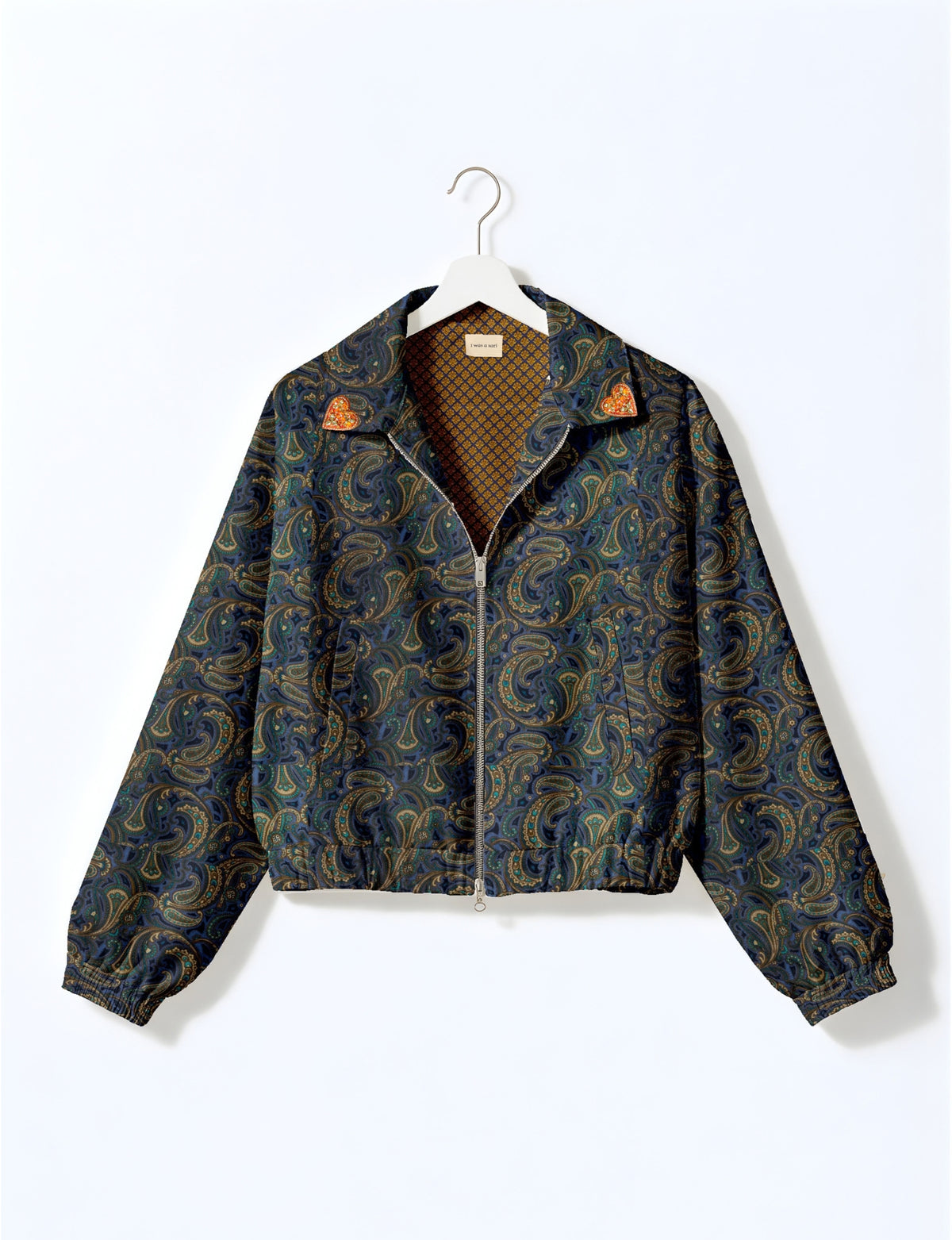 Love Bomber Jacket made from recycled fabric, featuring hand-stitched Aari embroidery. A unique piece of zero-waste clothing, part of the circular fashion movement. Designed with upcycled materials for a stylish yet environmentally friendly clothing choice.