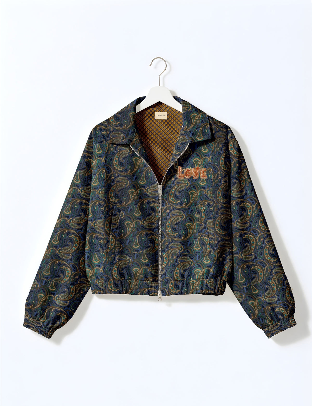 Love Bomber Jacket made from recycled fabric, featuring hand-stitched Aari embroidery. A unique piece of zero-waste clothing, part of the circular fashion movement. Designed with upcycled materials for a stylish yet environmentally friendly clothing choice.
