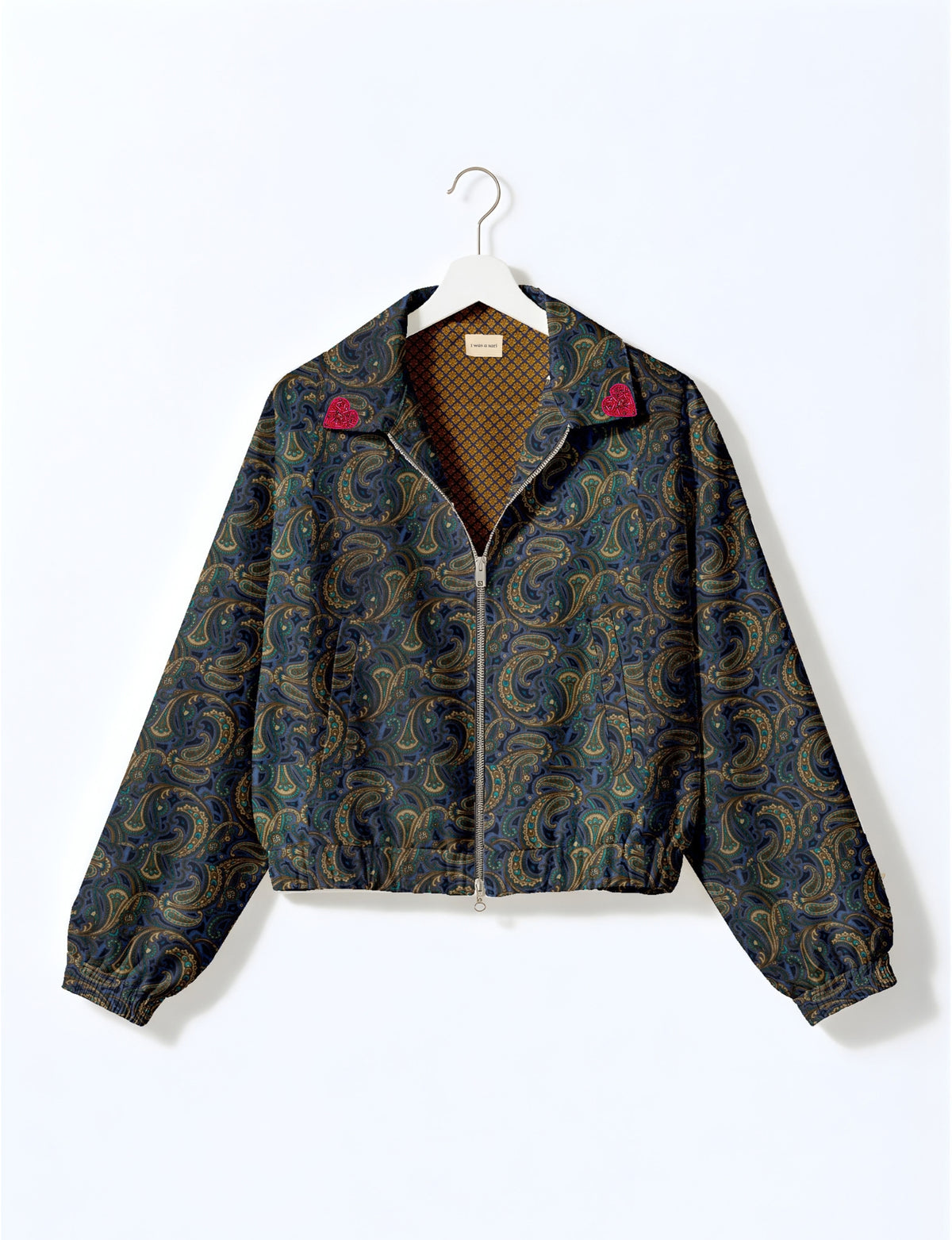Love Bomber Jacket made from recycled fabric, featuring hand-stitched Aari embroidery. A unique piece of zero-waste clothing, part of the circular fashion movement. Designed with upcycled materials for a stylish yet environmentally friendly clothing choice.