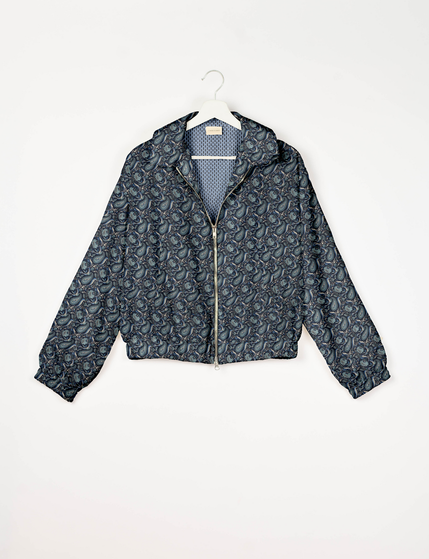 Upcycled Bomber Jacket made from recycled sari materials, featuring a cute cropped shape, elasticated hem and cuffs, and contrast sari print lining. Sustainable apparel promoting eco-friendly fashion and ethical clothing.