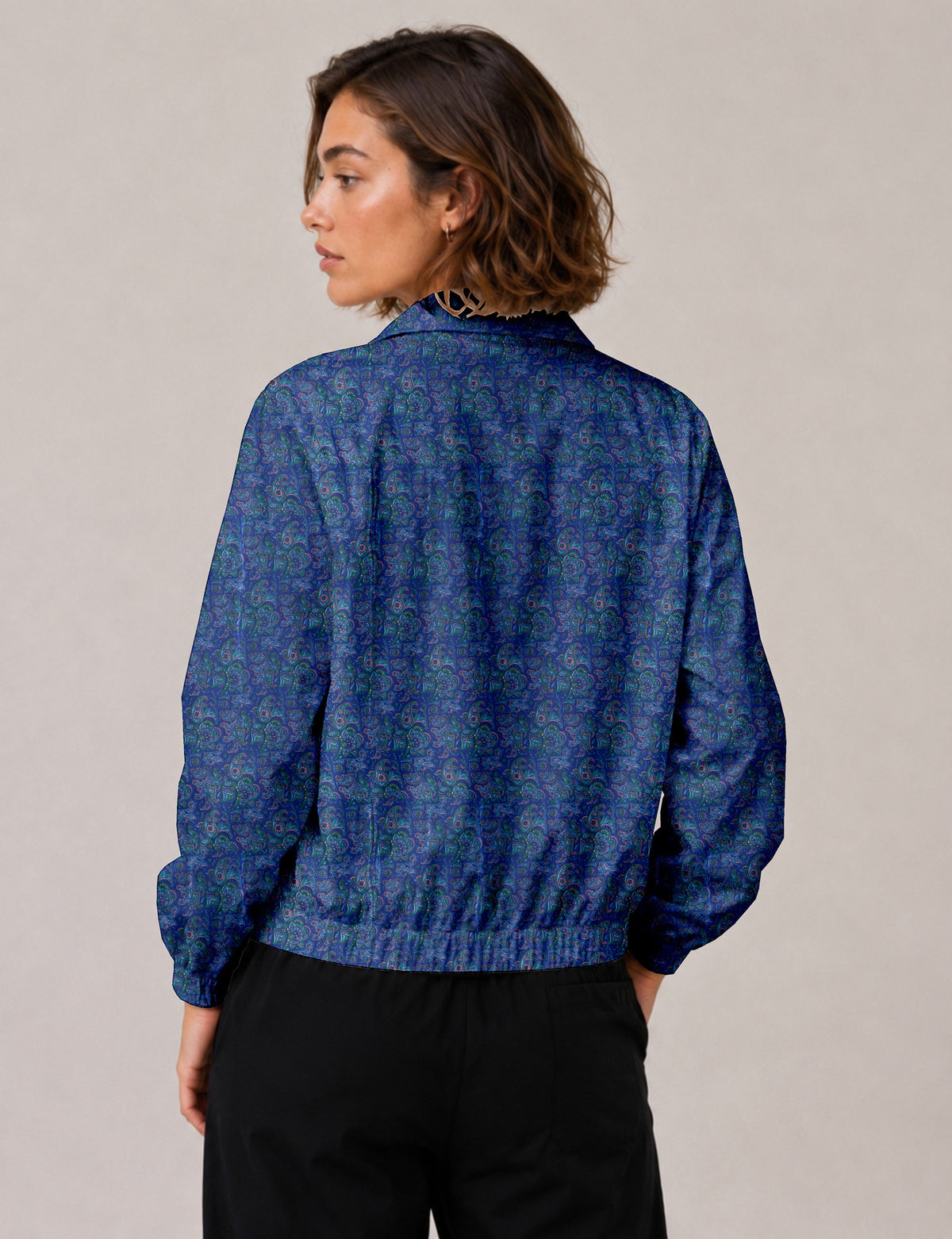 Love Bomber Jacket made from recycled fabric, featuring hand-stitched Aari embroidery. A unique piece of zero-waste clothing, part of the circular fashion movement. Designed with upcycled materials for a stylish yet environmentally friendly clothing choice.