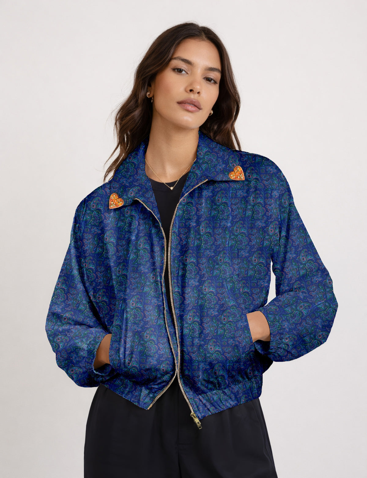 Make a bold statement with our Heart Drop Earrings, a symbol of conscious luxury and ethical fashion. Handcrafted using the intricate Aari embroidery technique, these earrings are made from upcycled sari fabric, embracing slow fashion and zero waste clothing. Elevate your look with sustainable apparel that supports fair trade fashion while reducing textile waste. Choose eco-friendly fashion that speaks of love, artistry, and responsibility.