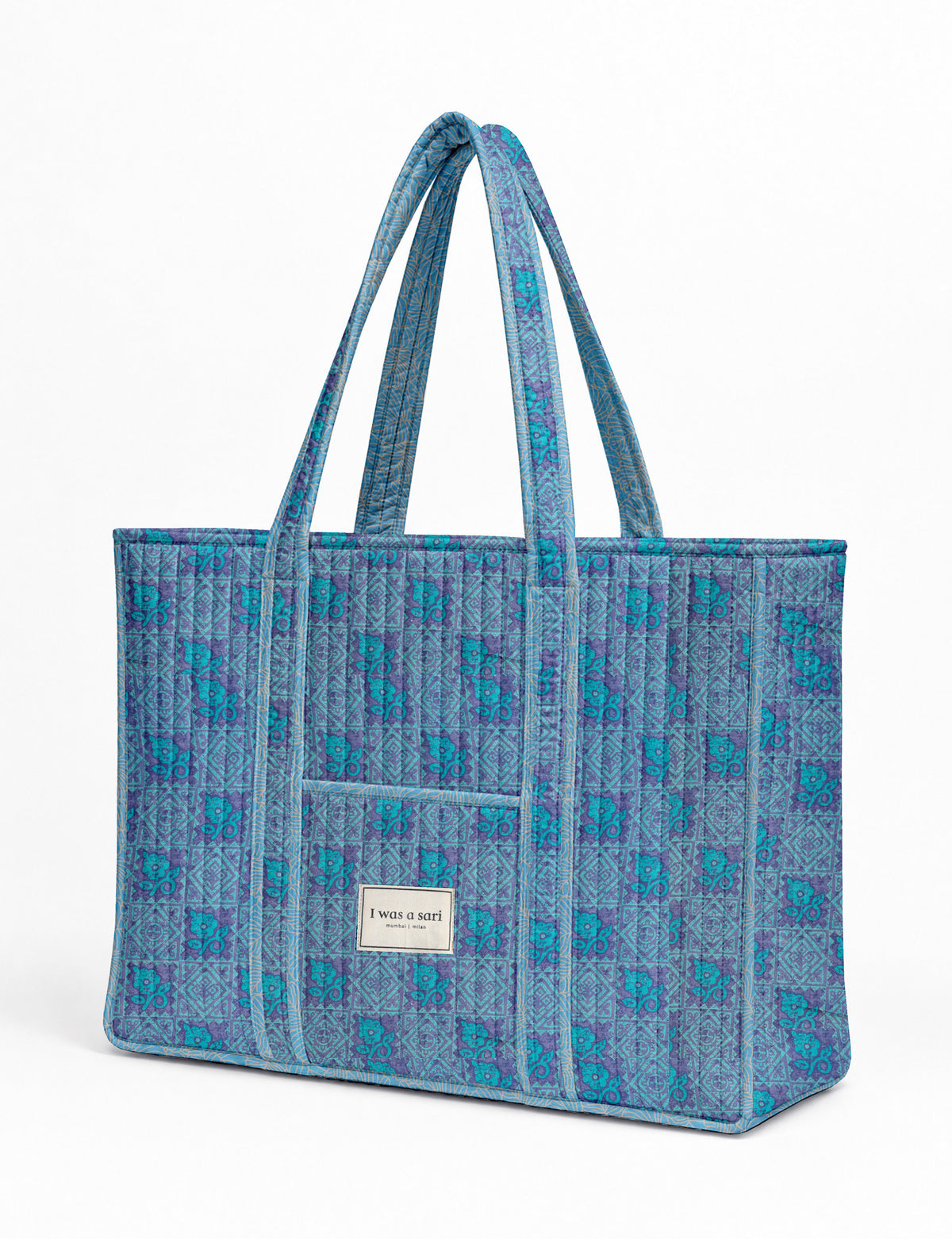 Quilted work tote bag with structured rectangular design and long shoulder straps, representing slow fashion and ethical clothing ideals, made as part of upcycled women's clothing and sustainable women's clothing using recycled fashion and earth friendly clothing practices.