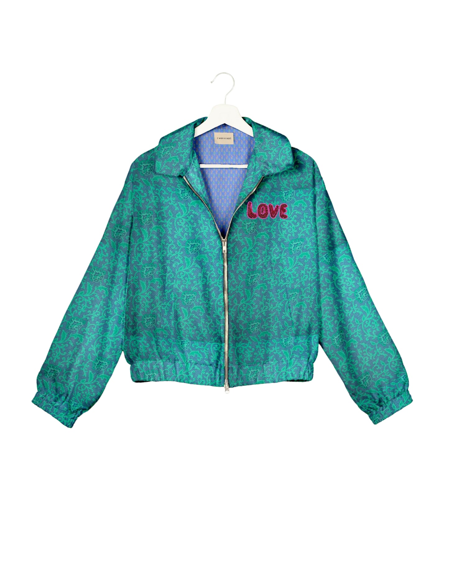 Love Bomber Jacket made from recycled fabric, featuring hand-stitched Aari embroidery. A unique piece of zero-waste clothing, part of the circular fashion movement. Designed with upcycled materials for a stylish yet environmentally friendly clothing choice.