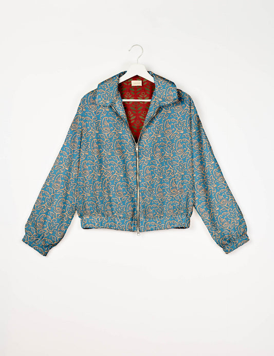 Stylish BOMBER JACKET, an upcycled clothing masterpiece with a cute cropped shape, elasticated details, and detachable metallic zipper. Contrast sari print lining adds a unique touch. Explore sustainable and eco-friendly fashion.