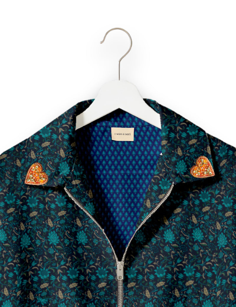 Love Bomber Jacket made from recycled fabric, featuring hand-stitched Aari embroidery. A unique piece of zero-waste clothing, part of the circular fashion movement. Designed with upcycled materials for a stylish yet environmentally friendly clothing choice.