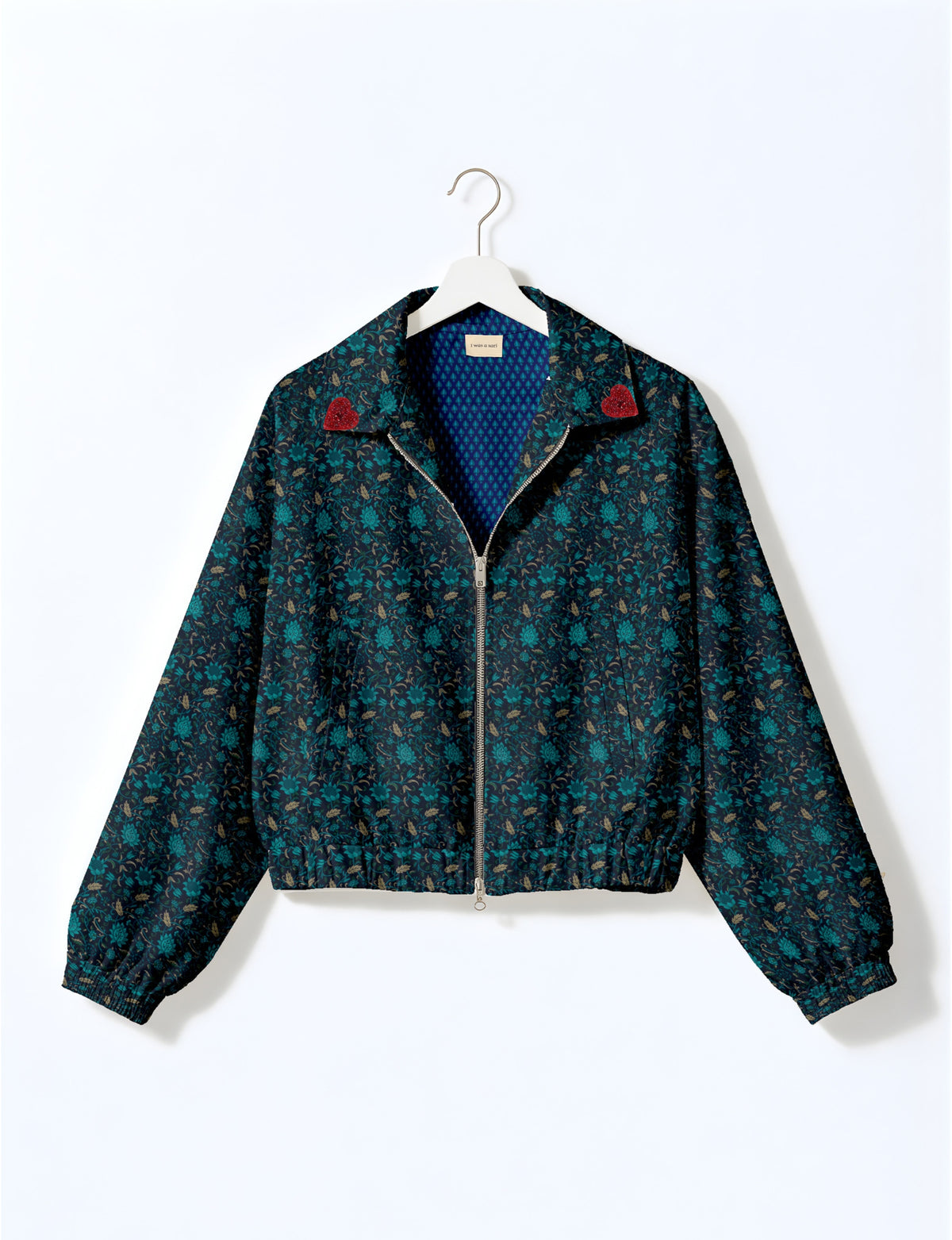 Love Bomber Jacket made from recycled fabric, featuring hand-stitched Aari embroidery. A unique piece of zero-waste clothing, part of the circular fashion movement. Designed with upcycled materials for a stylish yet environmentally friendly clothing choice.