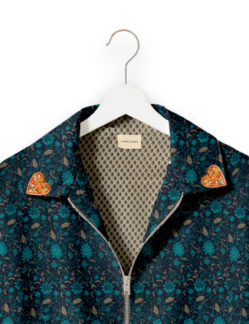 Love Bomber Jacket made from recycled fabric, featuring hand-stitched Aari embroidery. A unique piece of zero-waste clothing, part of the circular fashion movement. Designed with upcycled materials for a stylish yet environmentally friendly clothing choice.