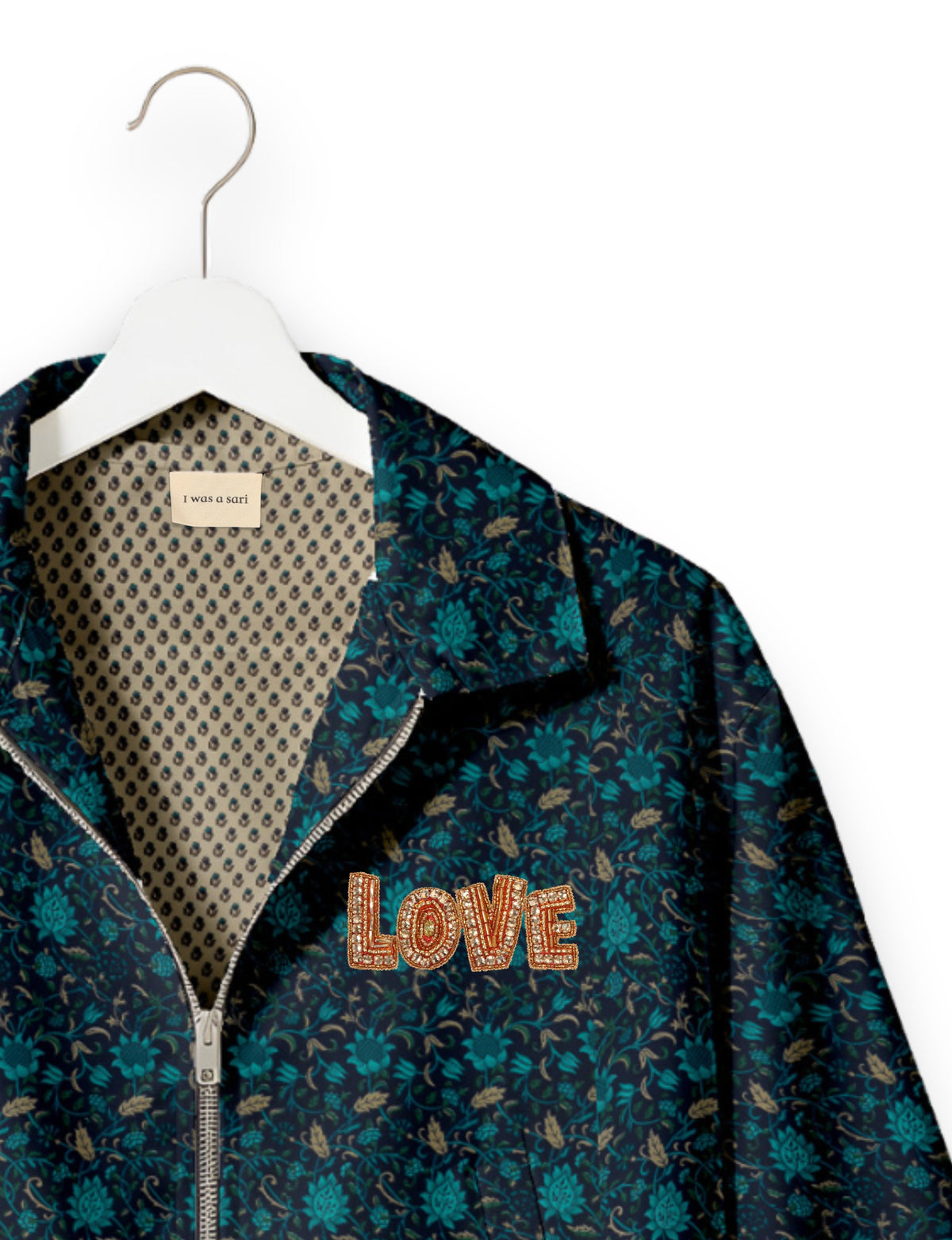 Love Bomber Jacket made from recycled fabric, featuring hand-stitched Aari embroidery. A unique piece of zero-waste clothing, part of the circular fashion movement. Designed with upcycled materials for a stylish yet environmentally friendly clothing choice.