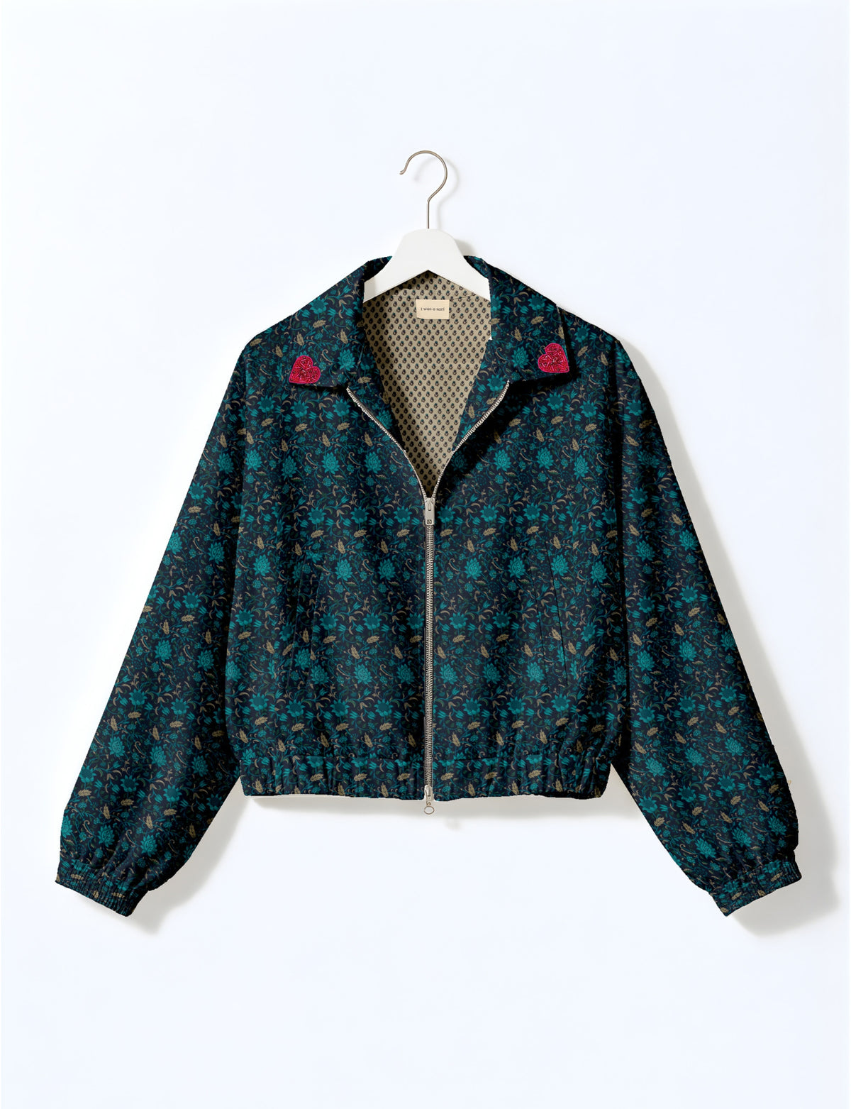Love Bomber Jacket made from recycled fabric, featuring hand-stitched Aari embroidery. A unique piece of zero-waste clothing, part of the circular fashion movement. Designed with upcycled materials for a stylish yet environmentally friendly clothing choice.