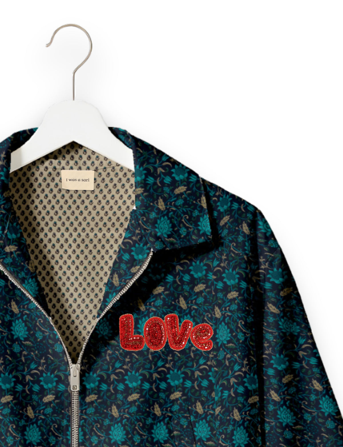 Love Bomber Jacket made from recycled fabric, featuring hand-stitched Aari embroidery. A unique piece of zero-waste clothing, part of the circular fashion movement. Designed with upcycled materials for a stylish yet environmentally friendly clothing choice.
