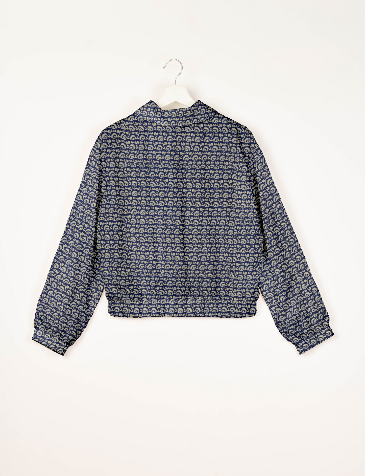 Upcycled Bomber Jacket made from recycled sari materials, featuring a cute cropped shape, elasticated hem and cuffs, and contrast sari print lining. Sustainable apparel promoting eco-friendly fashion and ethical clothing.