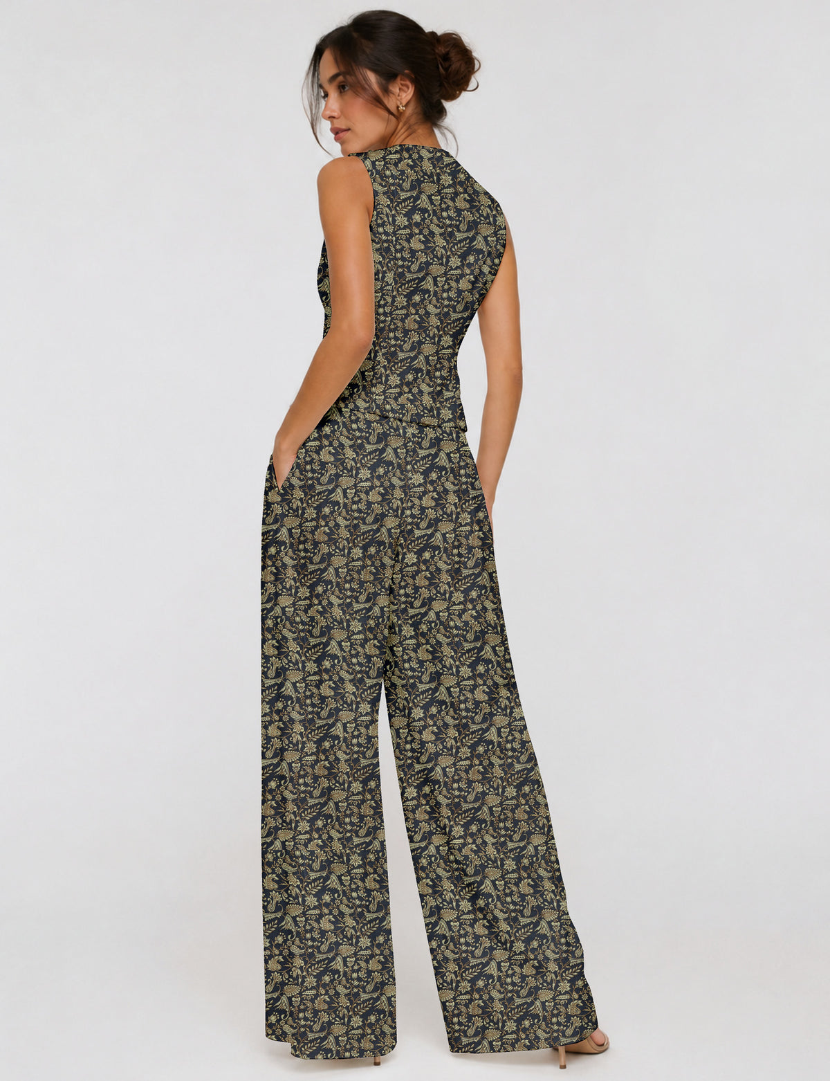 Women's tailored waistcoat set with a sleeveless V-neck button-front waistcoat and high-rise wide leg trousers in a coordinated matching outfit.