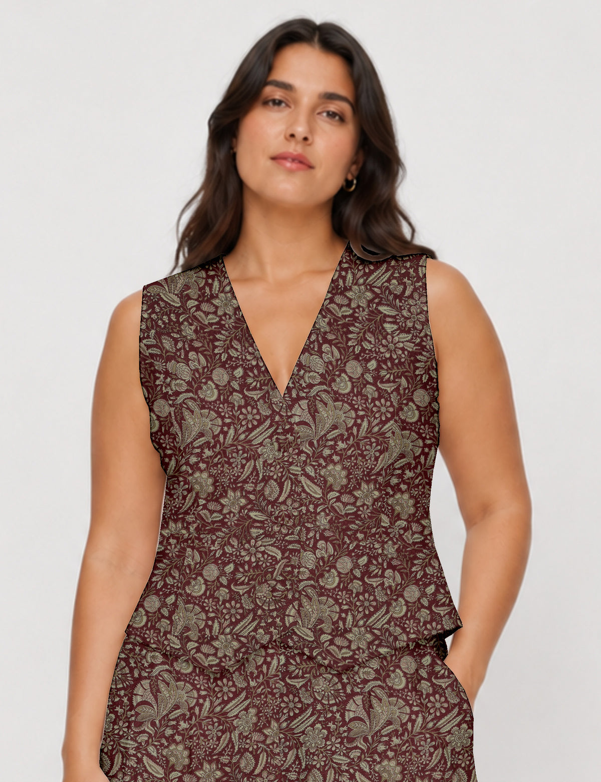 Women's fitted waistcoat with V-neck, single-breasted button closure, tailored silhouette, and pointed hem in sustainable fashion.