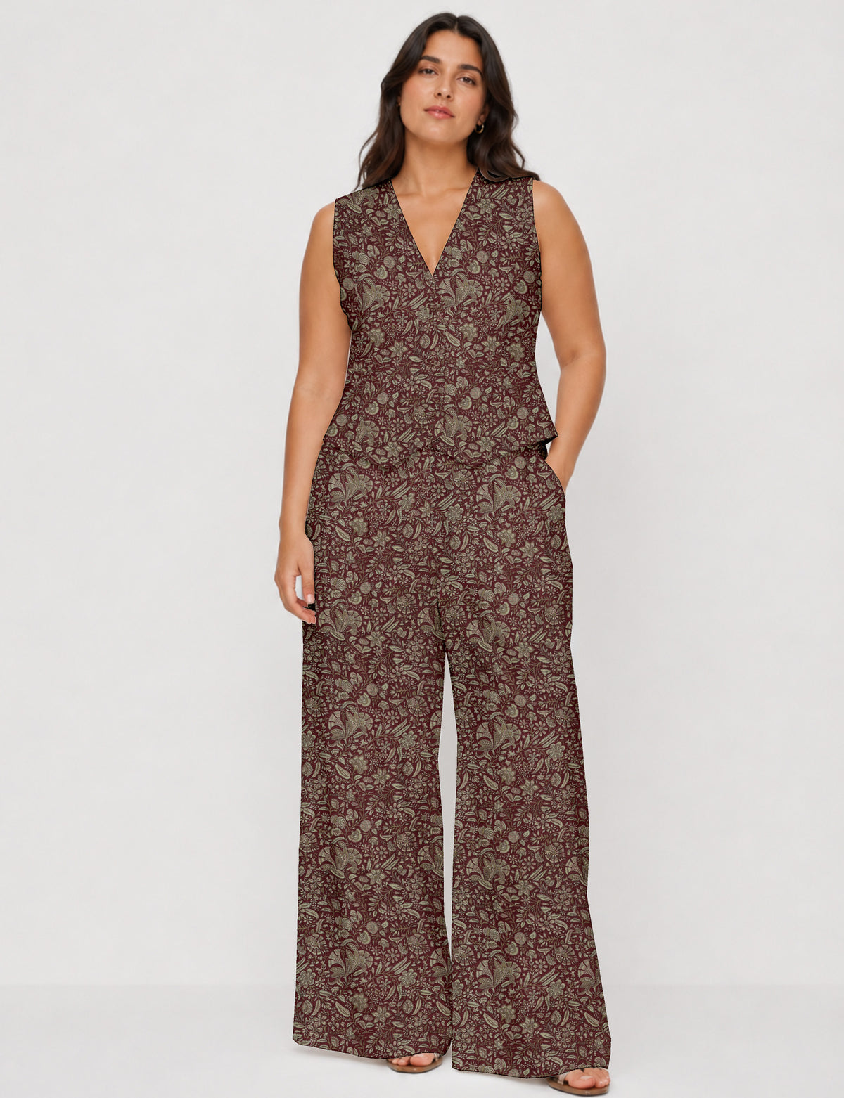 Women's tailored waistcoat set with a sleeveless V-neck button-front waistcoat and high-rise wide leg trousers in a coordinated matching outfit.