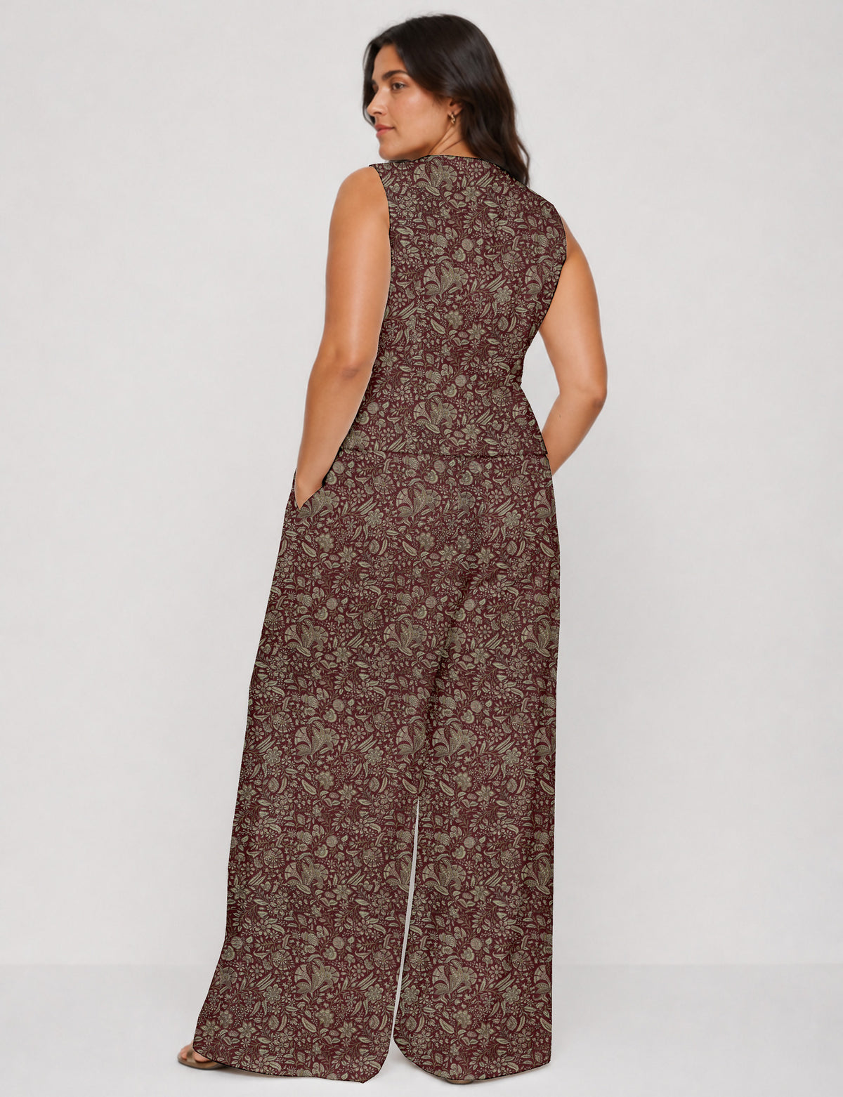 Women's tailored waistcoat set with a sleeveless V-neck button-front waistcoat and high-rise wide leg trousers in a coordinated matching outfit.