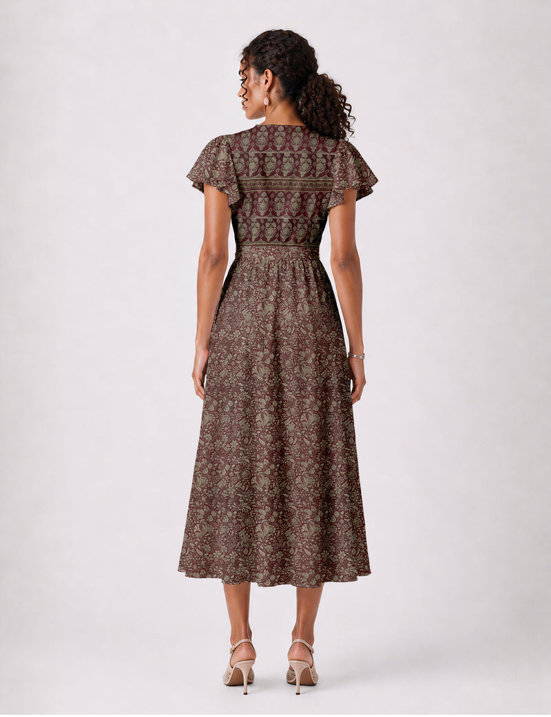 Elegant midi wrap dress with a V-neckline, adjustable waist tie, fitted bodice, and flared skirt for a timeless, flattering silhouette.