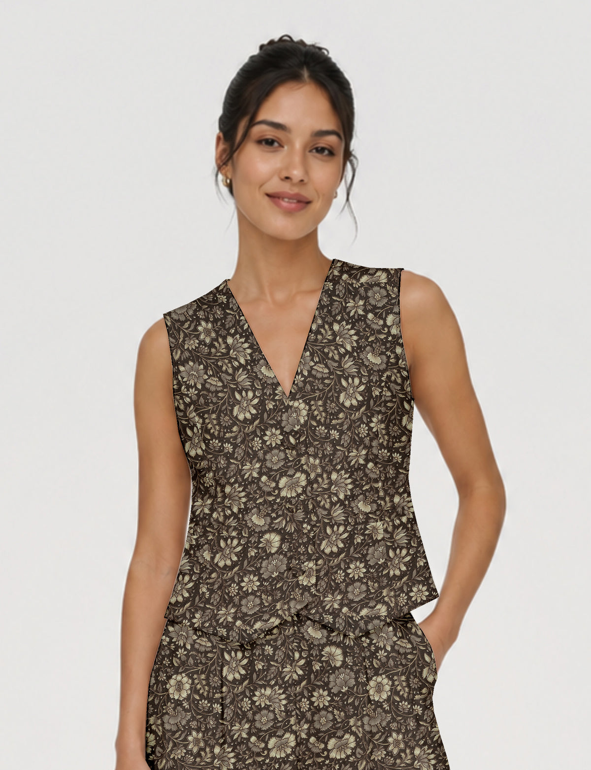 Women's fitted waistcoat with V-neck, single-breasted button closure, tailored silhouette, and pointed hem in sustainable fashion.