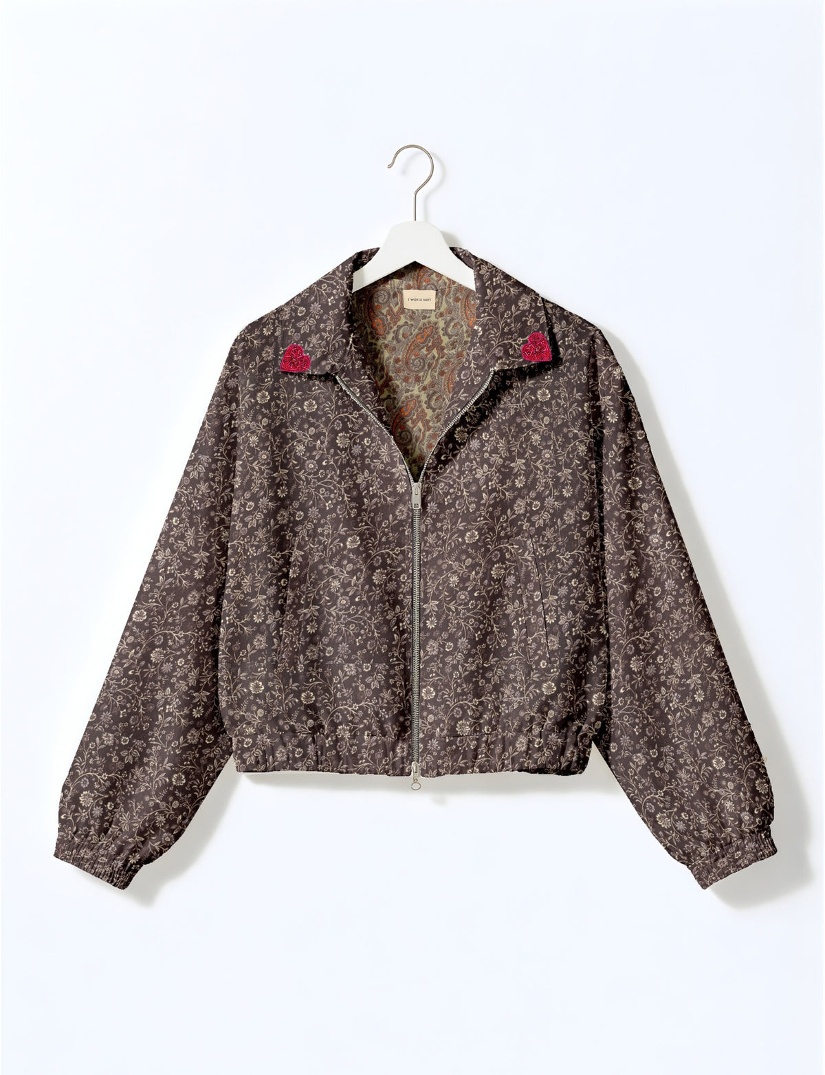 Love Bomber Jacket made from recycled fabric, featuring hand-stitched Aari embroidery. A unique piece of zero-waste clothing, part of the circular fashion movement. Designed with upcycled materials for a stylish yet environmentally friendly clothing choice.