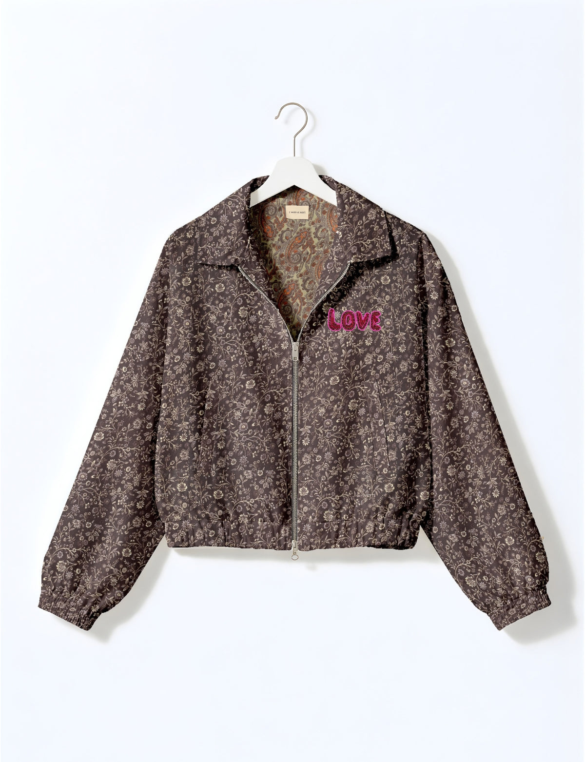 Love Bomber Jacket made from recycled fabric, featuring hand-stitched Aari embroidery. A unique piece of zero-waste clothing, part of the circular fashion movement. Designed with upcycled materials for a stylish yet environmentally friendly clothing choice.