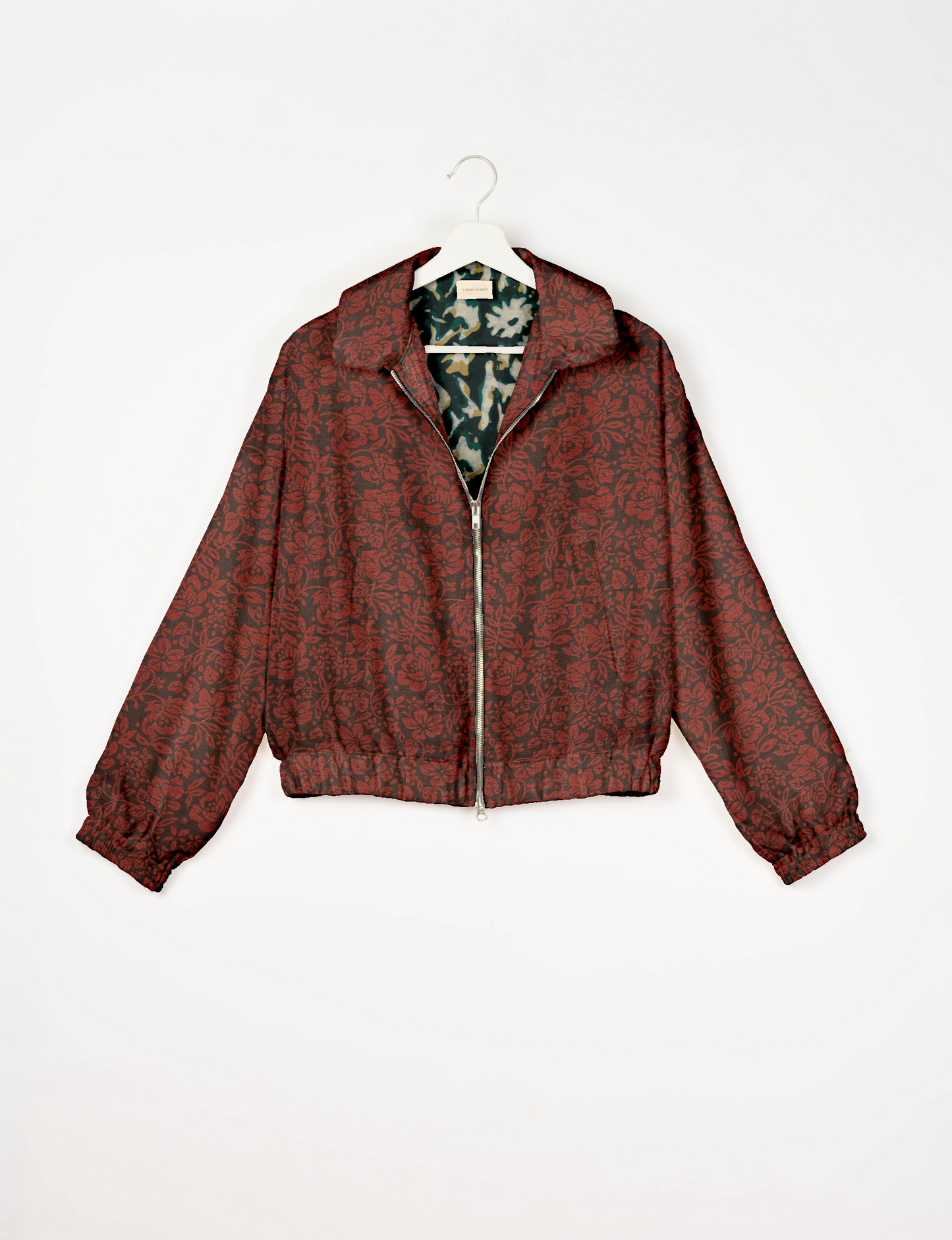 Upcycled Bomber Jacket made from recycled sari materials, featuring a cute cropped shape, elasticated hem and cuffs, and contrast sari print lining. Sustainable apparel promoting eco-friendly fashion and ethical clothing.