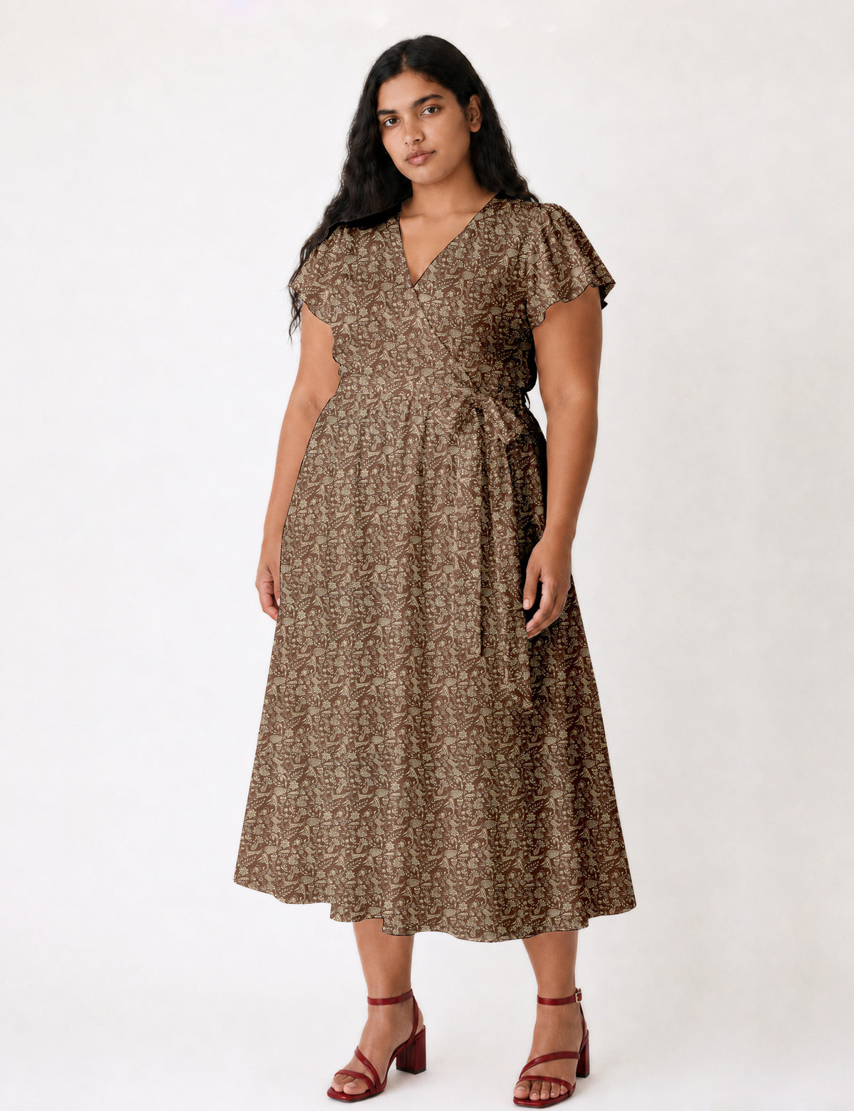 Elegant midi wrap dress with a V-neckline, adjustable waist tie, fitted bodice, and flared skirt for a timeless, flattering silhouette.