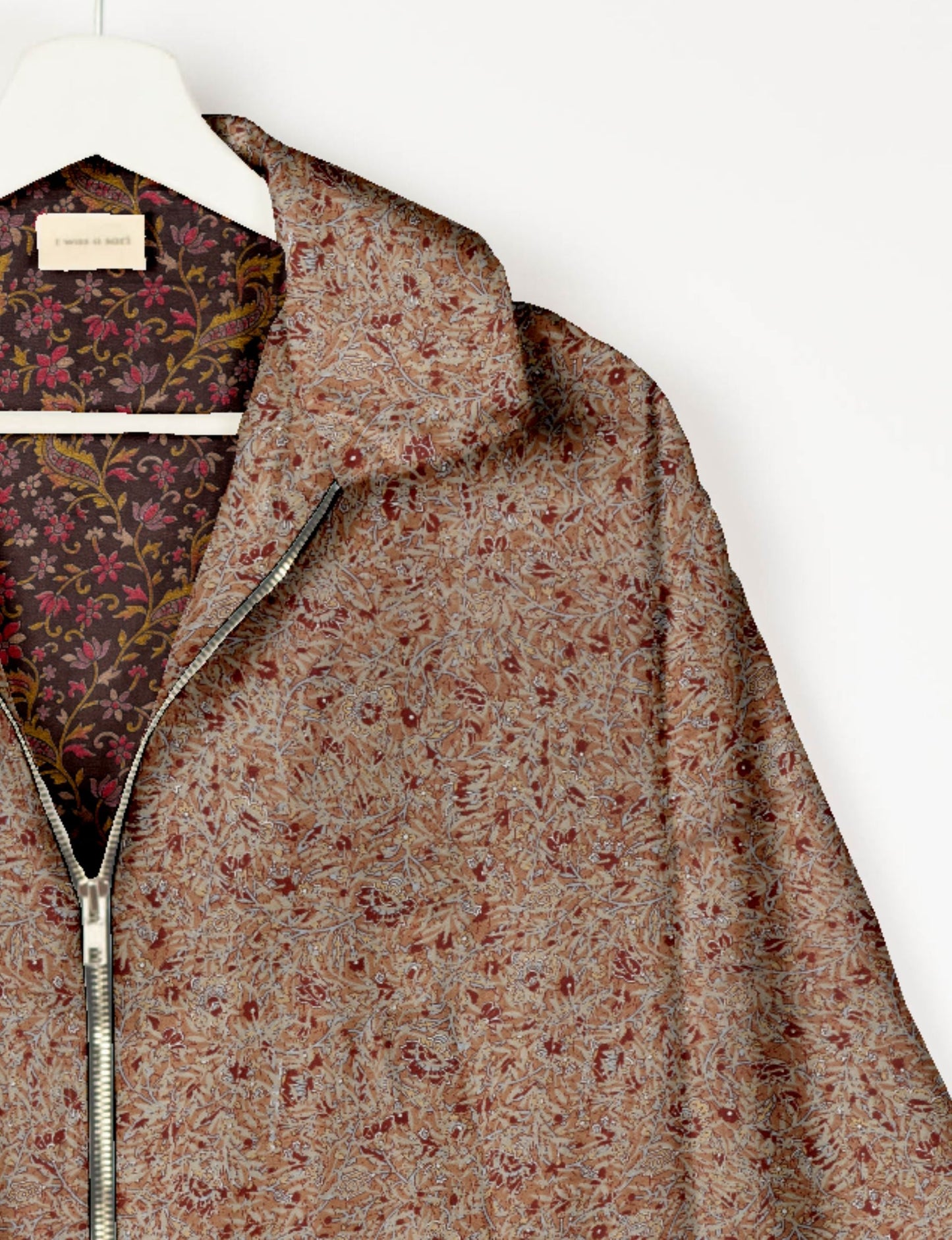 Upcycled Bomber Jacket made from recycled sari materials, featuring a cute cropped shape, elasticated hem and cuffs, and contrast sari print lining. Sustainable apparel promoting eco-friendly fashion and ethical clothing.