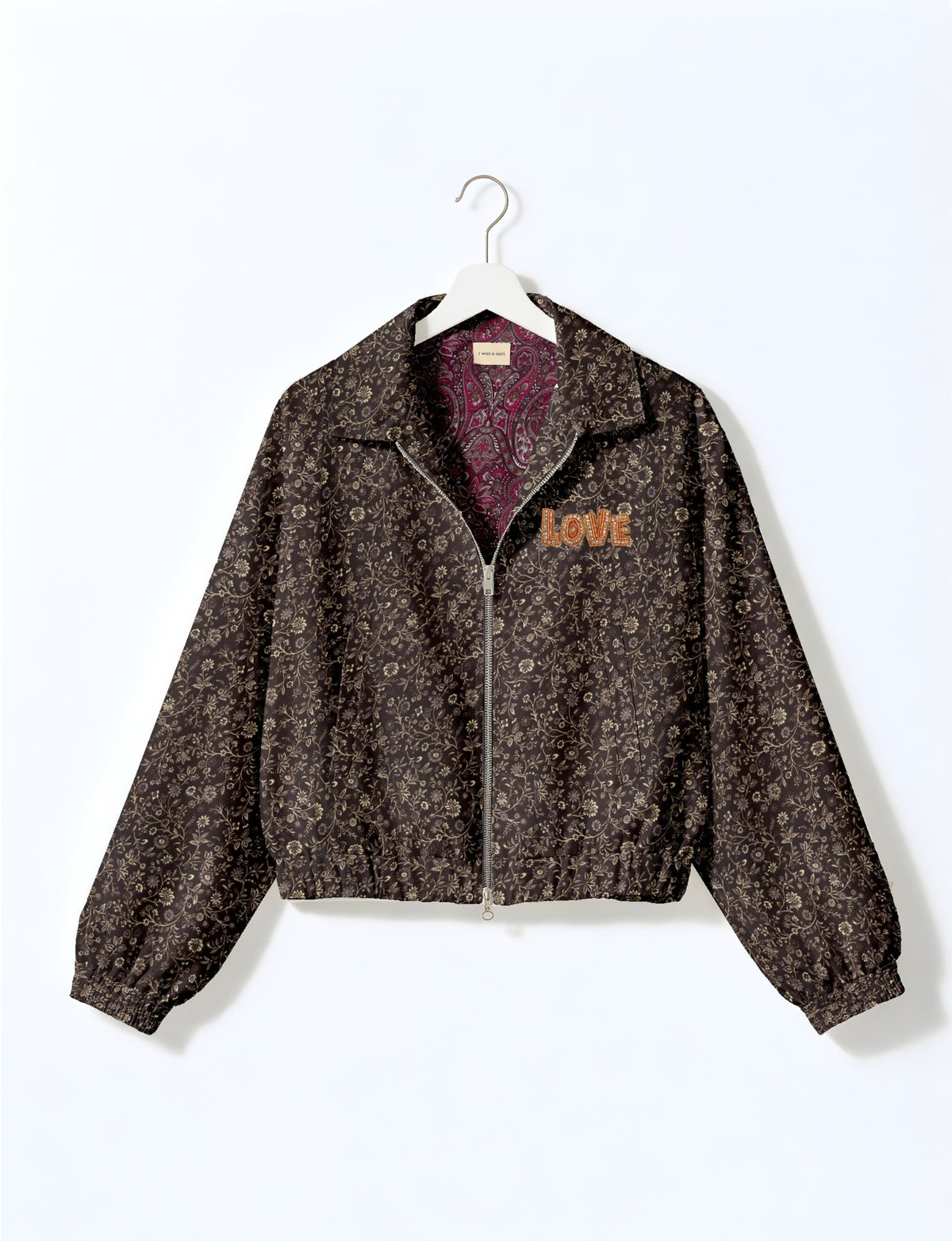 Love Bomber Jacket made from recycled fabric, featuring hand-stitched Aari embroidery. A unique piece of zero-waste clothing, part of the circular fashion movement. Designed with upcycled materials for a stylish yet environmentally friendly clothing choice.
