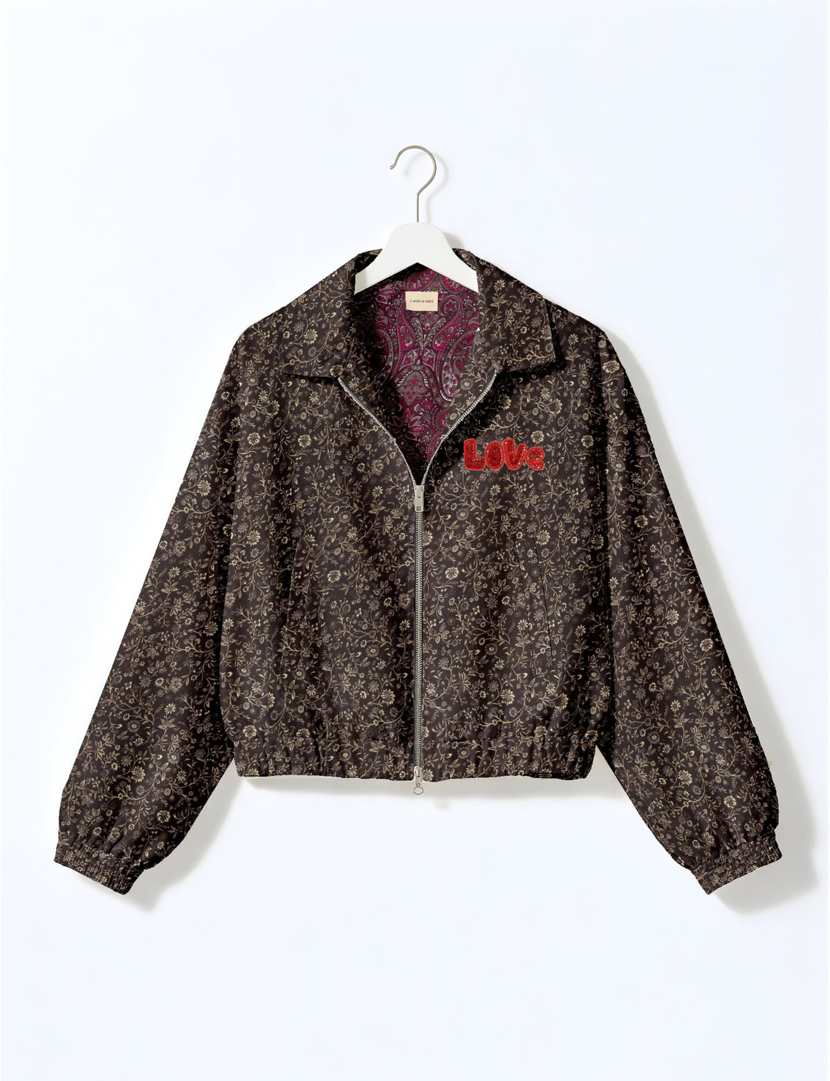 Love Bomber Jacket made from recycled fabric, featuring hand-stitched Aari embroidery. A unique piece of zero-waste clothing, part of the circular fashion movement. Designed with upcycled materials for a stylish yet environmentally friendly clothing choice.