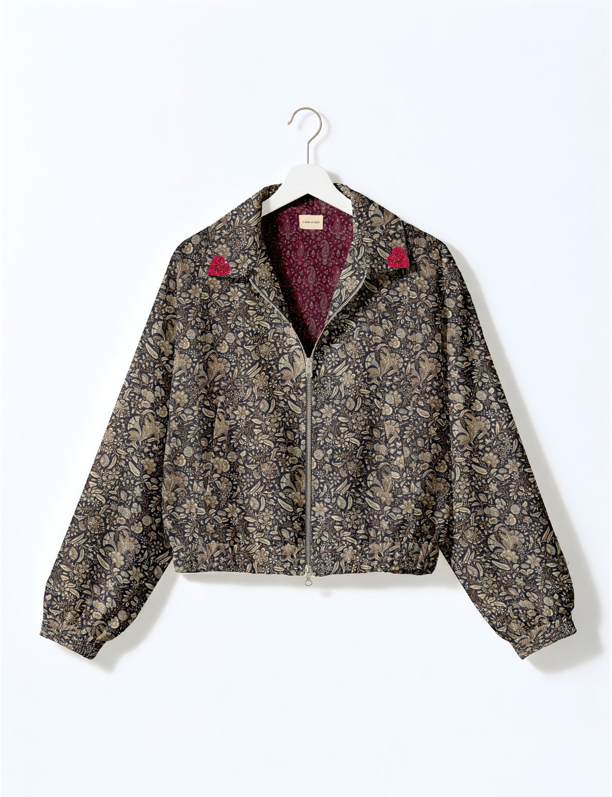 Love Bomber Jacket made from recycled fabric, featuring hand-stitched Aari embroidery. A unique piece of zero-waste clothing, part of the circular fashion movement. Designed with upcycled materials for a stylish yet environmentally friendly clothing choice.