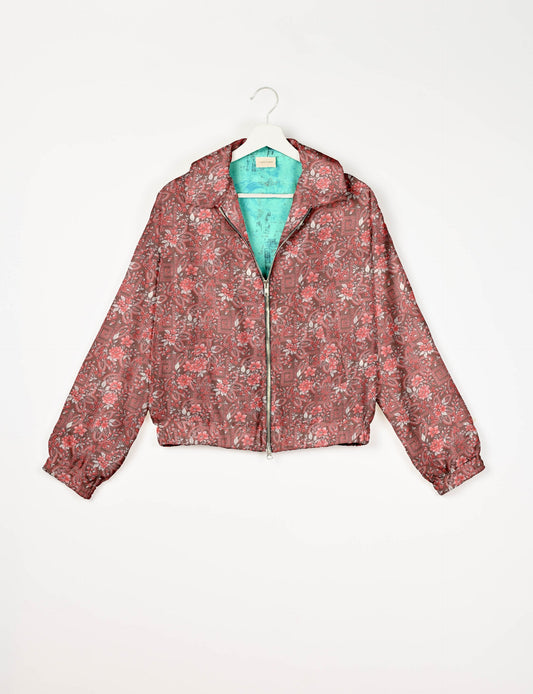 Stylish BOMBER JACKET, an upcycled clothing masterpiece with a cute cropped shape, elasticated details, and detachable metallic zipper. Contrast sari print lining adds a unique touch. Explore sustainable and eco-friendly fashion.