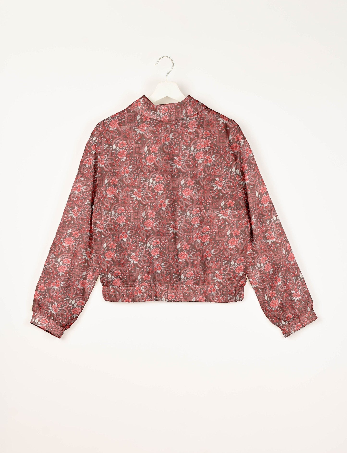 Stylish BOMBER JACKET, an upcycled clothing masterpiece with a cute cropped shape, elasticated details, and detachable metallic zipper. Contrast sari print lining adds a unique touch. Explore sustainable and eco-friendly fashion.