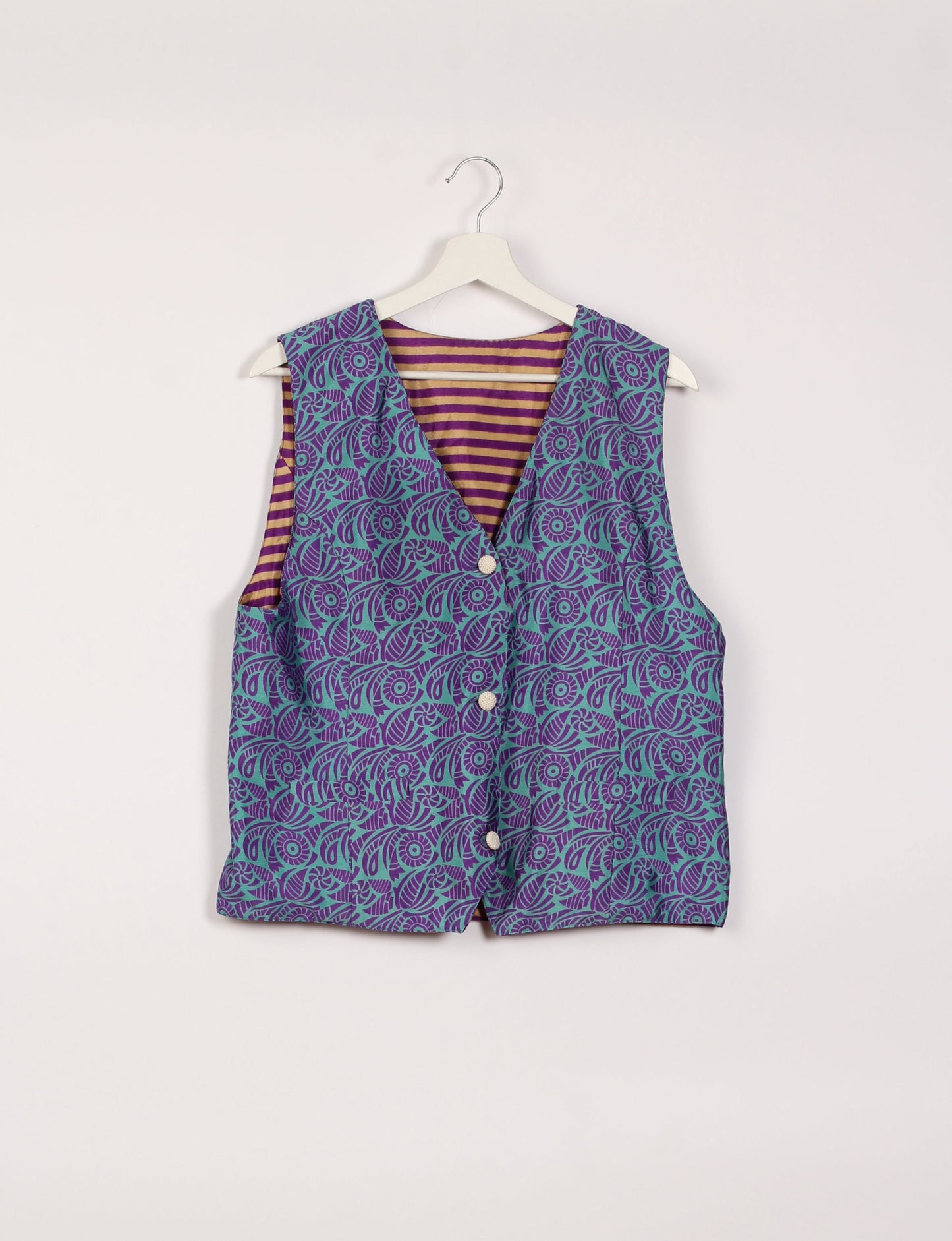 Day Waistcoat made from repurposed saris with macramé-covered buttons, showcasing eco clothing and recycled sari fashion for an eco-friendly, upcycled women's garment.