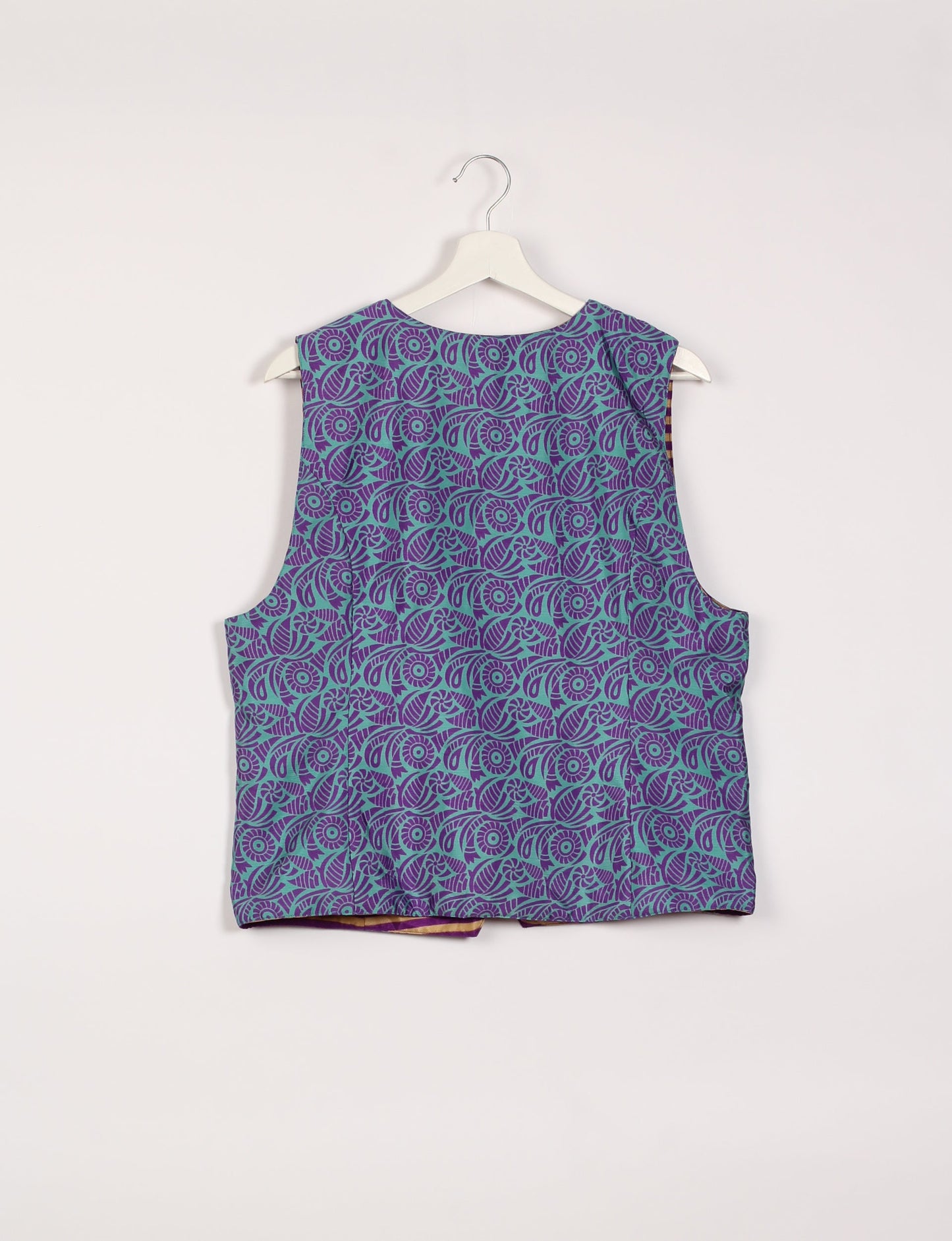 Day Waistcoat made from repurposed saris with macramé-covered buttons, showcasing eco clothing and recycled sari fashion for an eco-friendly, upcycled women's garment.