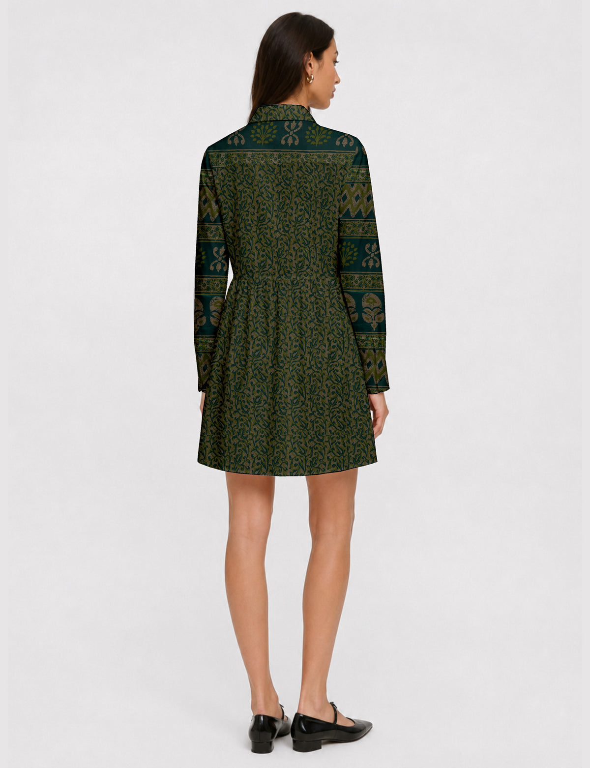 Short shirt dress with a relaxed A-line silhouette, point collar, partial button placket, gathered waist, side pockets, and full-length cuffed sleeves.