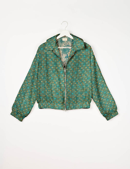 Upcycled Bomber Jacket made from recycled sari materials, featuring a cute cropped shape, elasticated hem and cuffs, and contrast sari print lining. Sustainable apparel promoting eco-friendly fashion and ethical clothing.