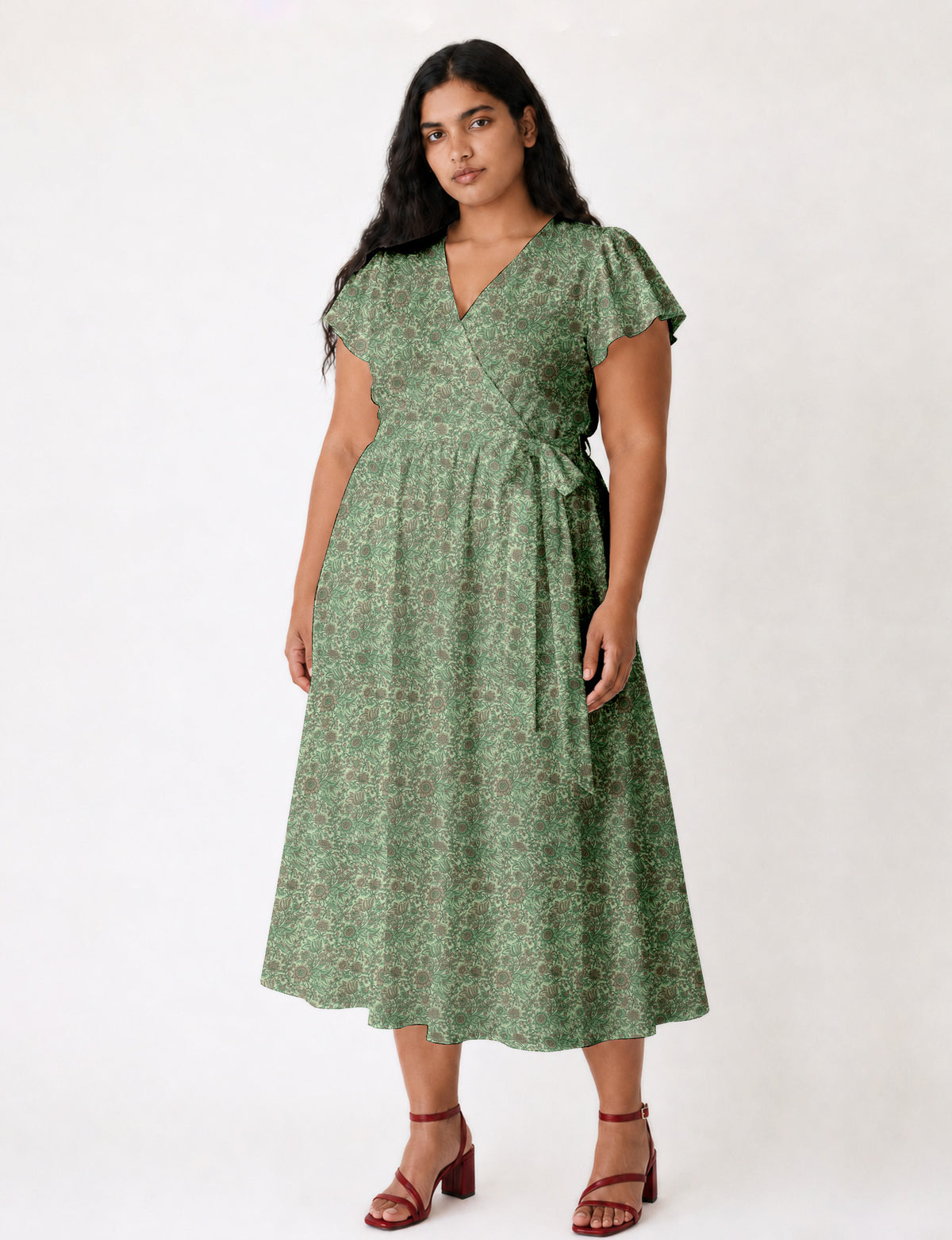 Elegant midi wrap dress with a V-neckline, adjustable waist tie, fitted bodice, and flared skirt for a timeless, flattering silhouette.