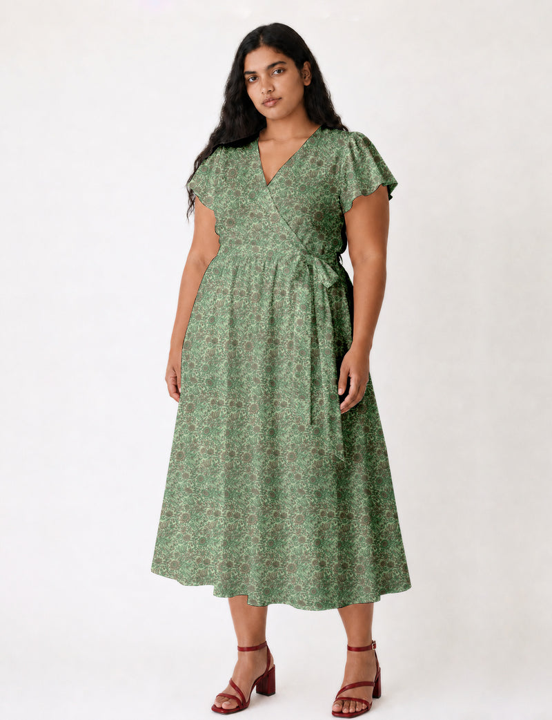 Elegant midi wrap dress with a V-neckline, adjustable waist tie, fitted bodice, and flared skirt for a timeless, flattering silhouette.