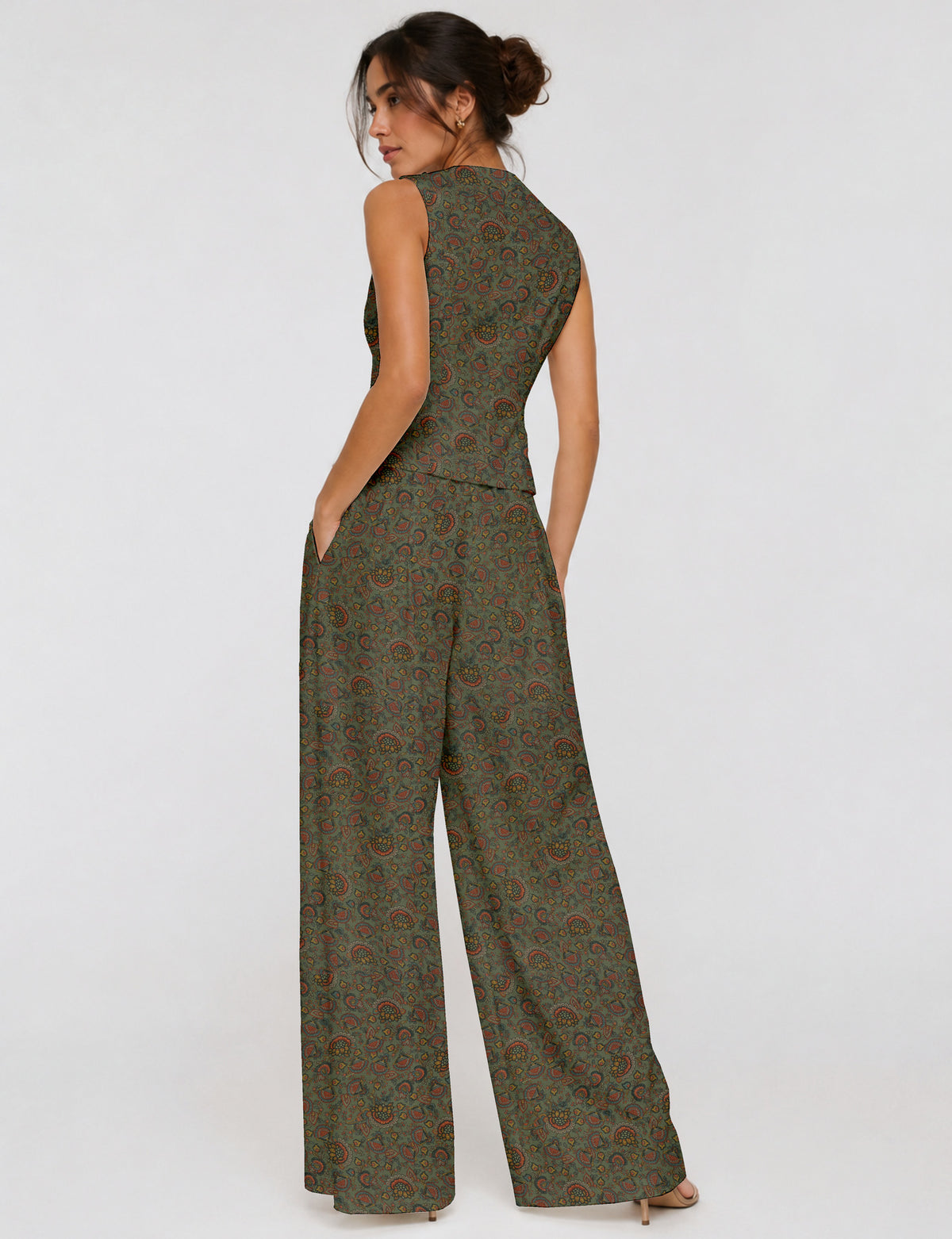 Women's tailored waistcoat set with a sleeveless V-neck button-front waistcoat and high-rise wide leg trousers in a coordinated matching outfit.