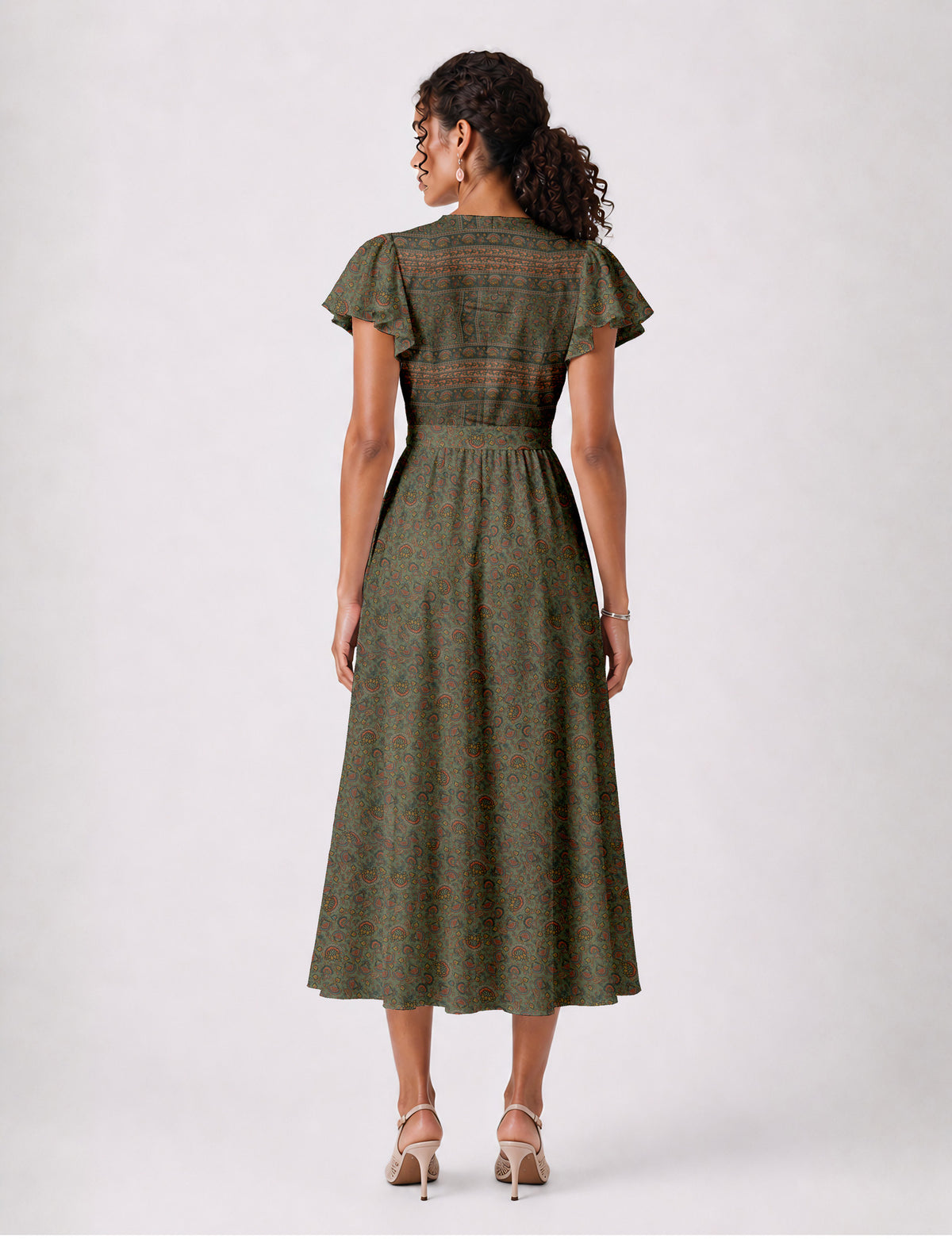 Elegant midi wrap dress with a V-neckline, adjustable waist tie, fitted bodice, and flared skirt for a timeless, flattering silhouette.