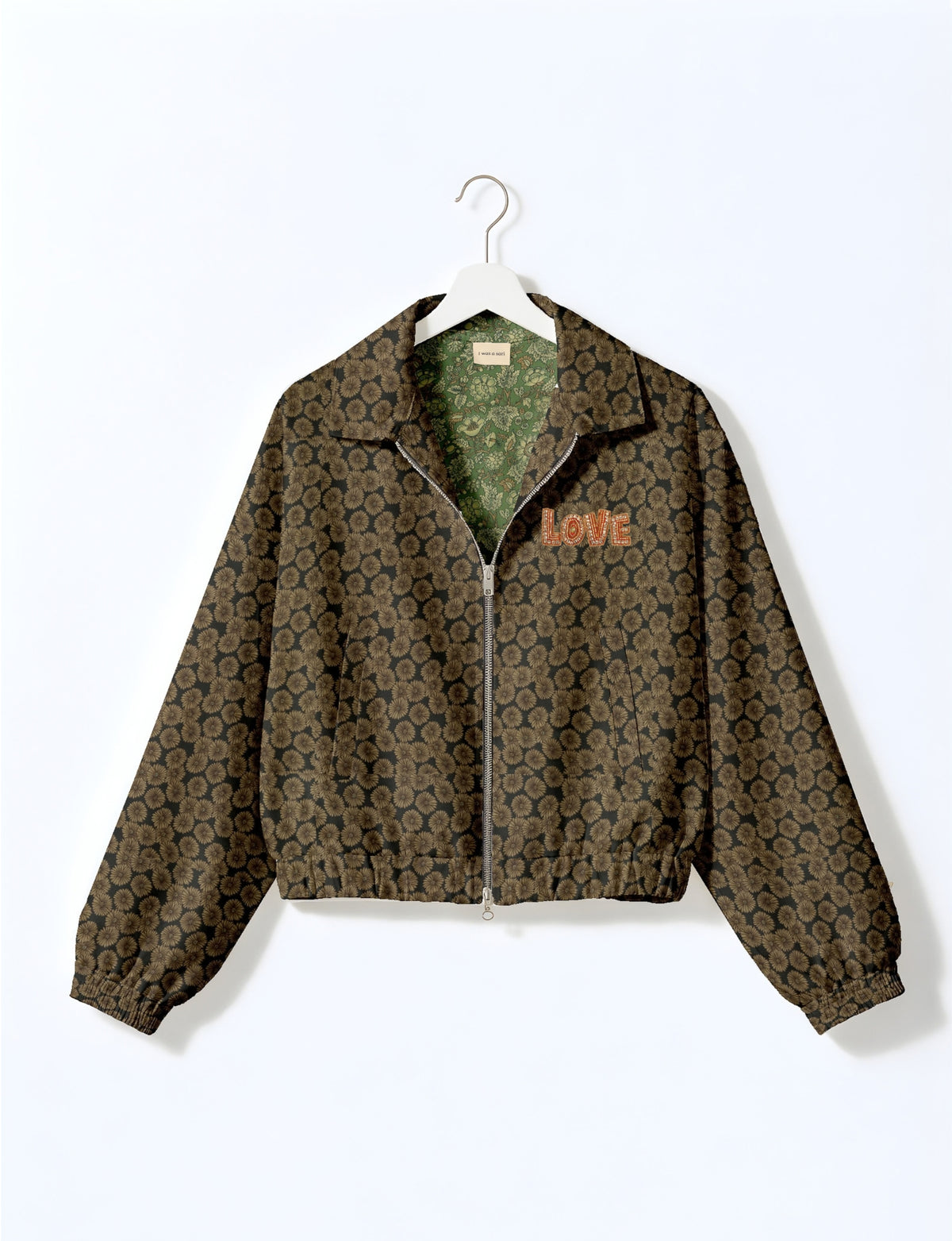 Love Bomber Jacket made from recycled fabric, featuring hand-stitched Aari embroidery. A unique piece of zero-waste clothing, part of the circular fashion movement. Designed with upcycled materials for a stylish yet environmentally friendly clothing choice.