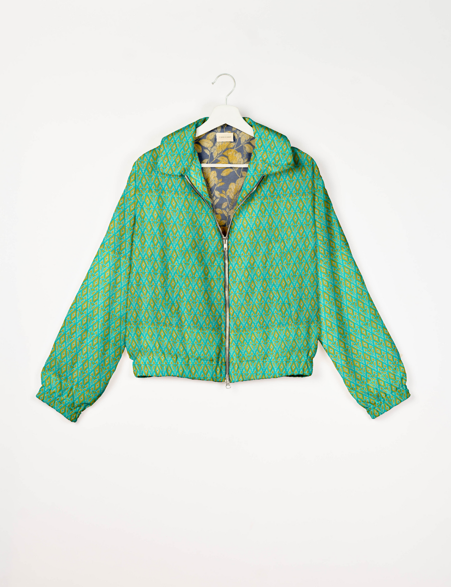 Upcycled Bomber Jacket made from recycled sari materials, featuring a cute cropped shape, elasticated hem and cuffs, and contrast sari print lining. Sustainable apparel promoting eco-friendly fashion and ethical clothing.