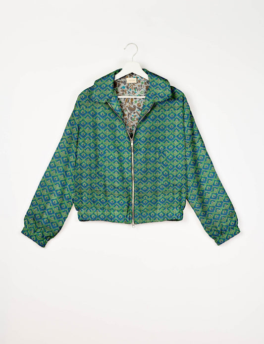 Upcycled Bomber Jacket made from recycled sari materials, featuring a cute cropped shape, elasticated hem and cuffs, and contrast sari print lining. Sustainable apparel promoting eco-friendly fashion and ethical clothing.