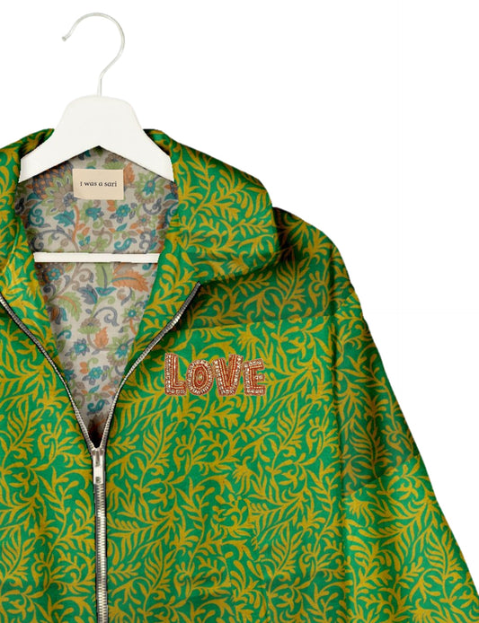 Love Bomber Jacket made from recycled fabric, featuring hand-stitched Aari embroidery. A unique piece of zero-waste clothing, part of the circular fashion movement. Designed with upcycled materials for a stylish yet environmentally friendly clothing choice.