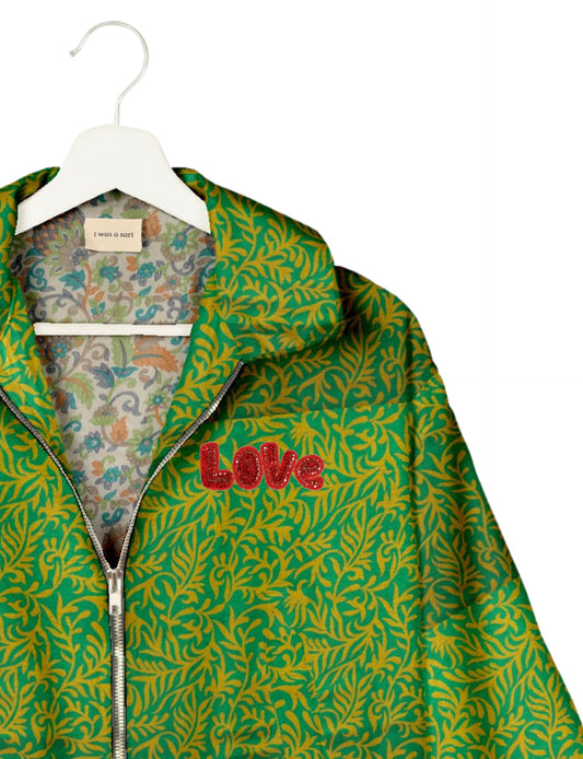 Love Bomber Jacket made from recycled fabric, featuring hand-stitched Aari embroidery. A unique piece of zero-waste clothing, part of the circular fashion movement. Designed with upcycled materials for a stylish yet environmentally friendly clothing choice.
