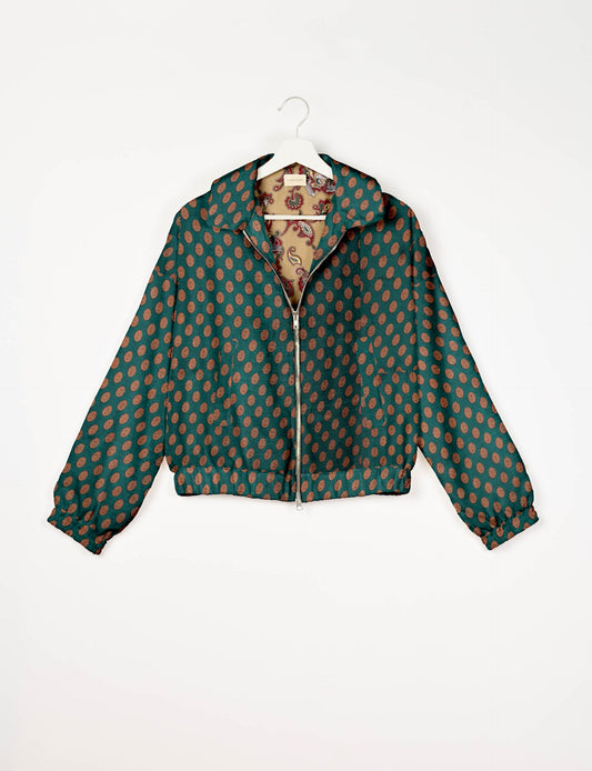 Upcycled Bomber Jacket made from recycled sari materials, featuring a cute cropped shape, elasticated hem and cuffs, and contrast sari print lining. Sustainable apparel promoting eco-friendly fashion and ethical clothing.
