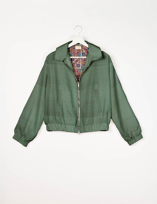 Upcycled Bomber Jacket made from recycled sari materials, featuring a cute cropped shape, elasticated hem and cuffs, and contrast sari print lining. Sustainable apparel promoting eco-friendly fashion and ethical clothing.