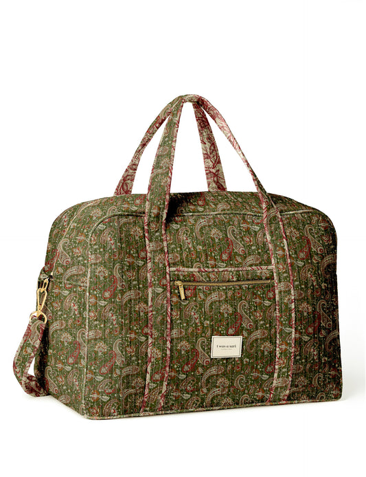 Quilted travel duffle bag with spacious main compartment and zip closure
Stylish quilted duffle bag with dual handles and shoulder strap
Quilted gym and travel bag for everyday use and short trips
I was a Sari quilted duffle bag front view showing structured design
Quilted duffle bag side view with detachable shoulder strap
Open quilted duffle bag showing large storage space inside